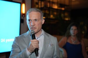  Dr. Ralph Maurer, Head of School at Oxbridge Academy speaking at the mic during The Jed Foundation Florida Gala